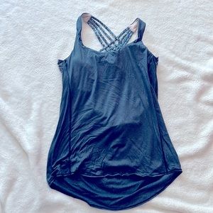 Lululemon tank top with built in bra. Size 12. Never worn.